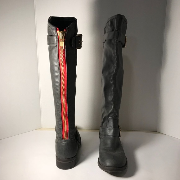 black boots with red zipper